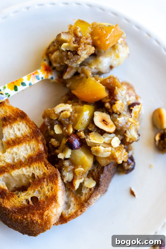 Bite of Baked Brie Apple Crisp