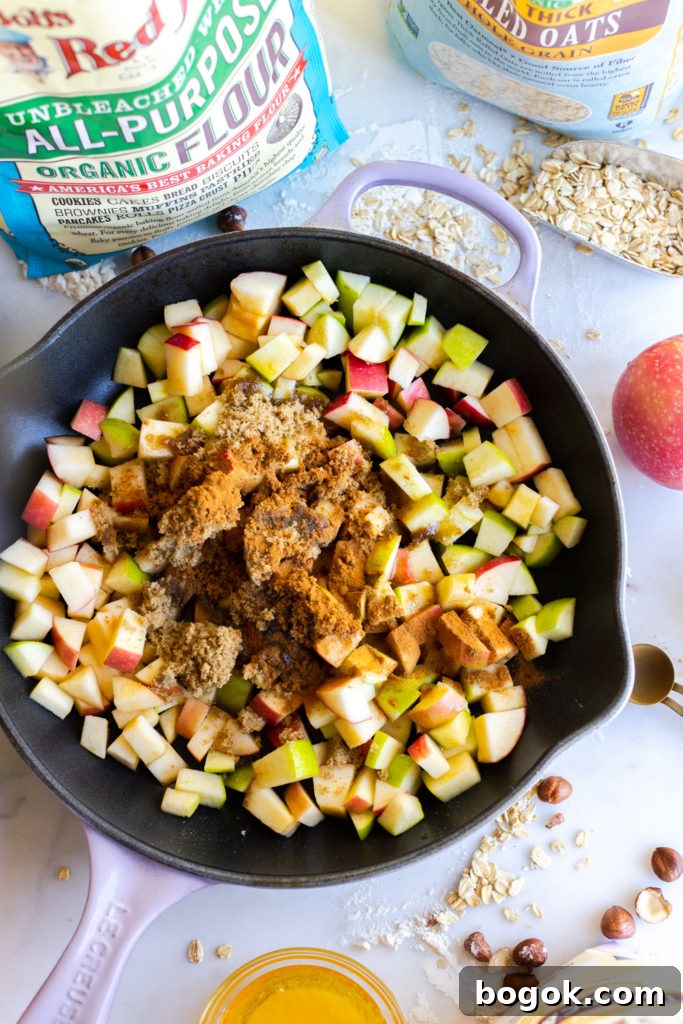 Baked Brie Apple Crisp assembly of apples