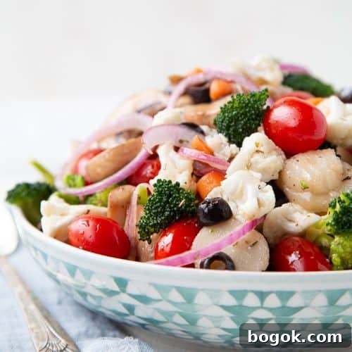 marinated vegetable salad in a low decorative bowl.