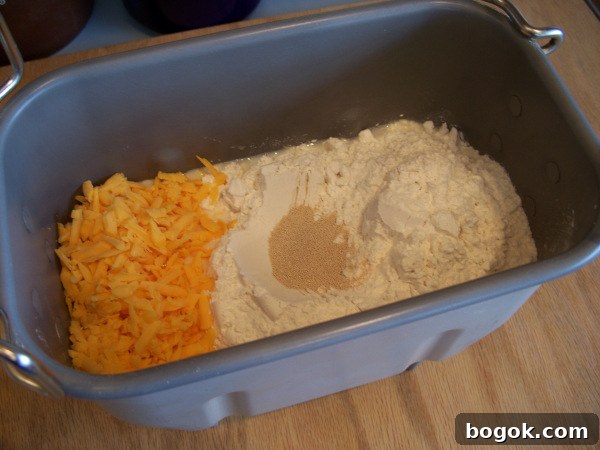 Cheesy Bread for Bread Machines: Simple Homemade Recipe 5 Cheese bread in pan