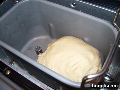 Cheesy Bread for Bread Machines: Simple Homemade Recipe 6 Smooth, round ball of dough