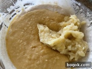 Fold in mashed banana and egg mixture into levain batter