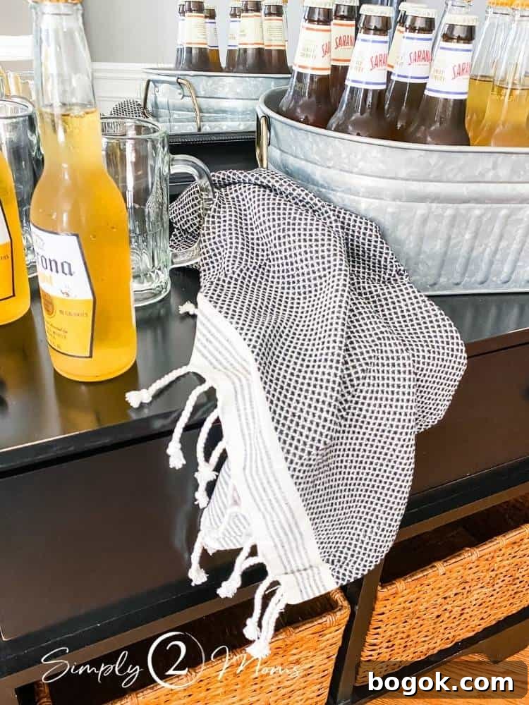 Simply Stated: 35 Clear Ideas for Everyday Living 5 close up of dish towels next to 2 bottles of beer and empty classes on table