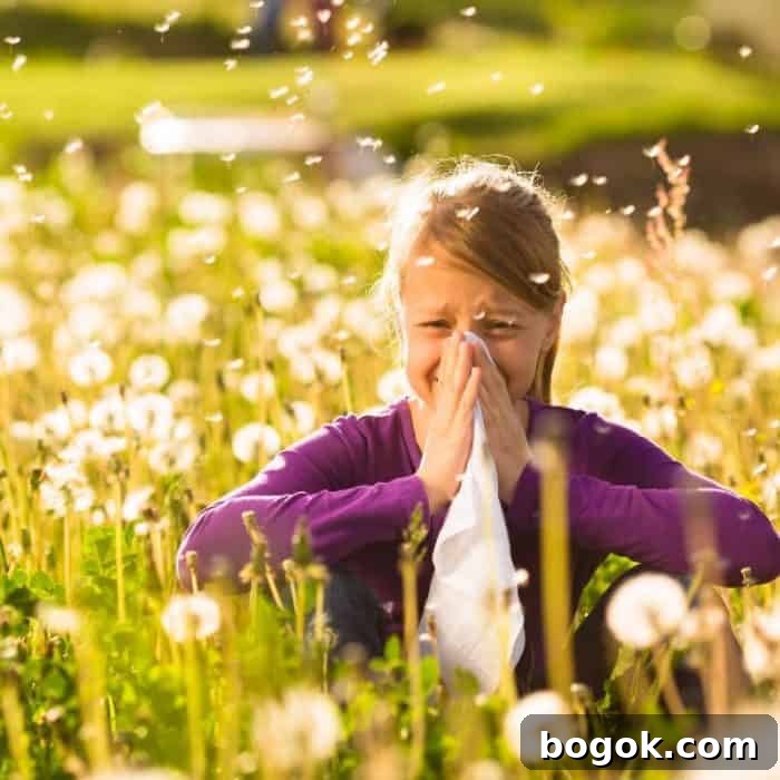 Spring Essential Oil Recipes: Diffuser Blends, DIY Cleaners & Bug Spray 3 girl in dandelion field suffering from seasonal allergies