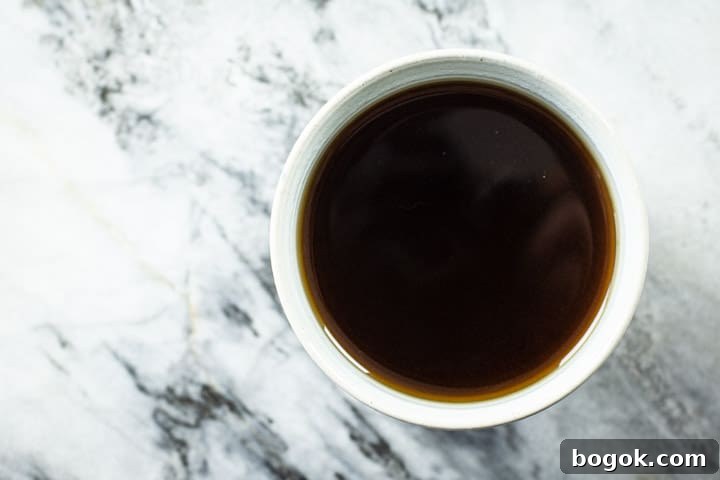 cup of black coffee on a marble surface