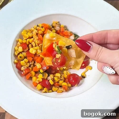 Finished bowl of Make-Ahead Corn Salsa Dip ready to serve