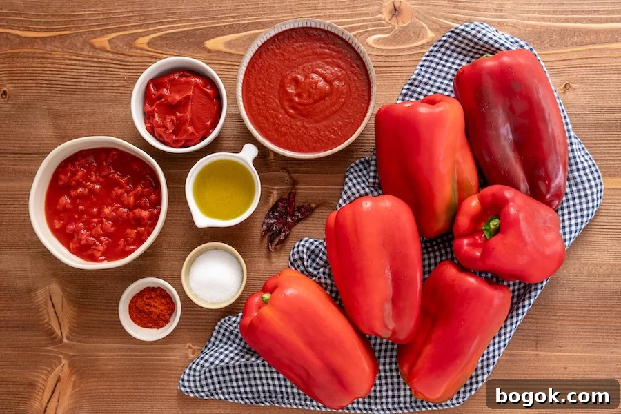 ingredients for Matbucha (tomatoes, red bell peppers, olive oil, salt, sugar, paprika, chili peppers).