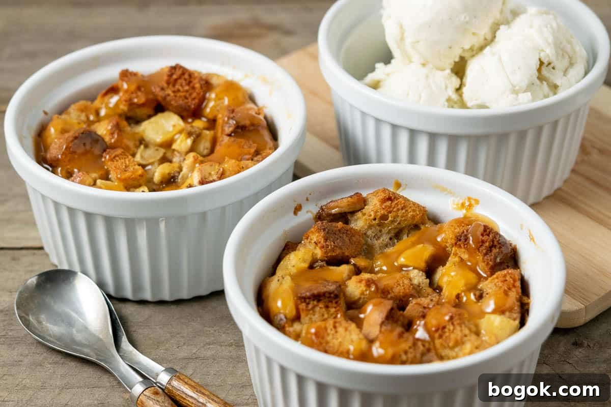 Pineapple Banana Bread Pudding Recipe for Moist, Fruity Dessert 7 Pineapple Banana Bread Pudding topped with caramel sauce and a side of ice cream.