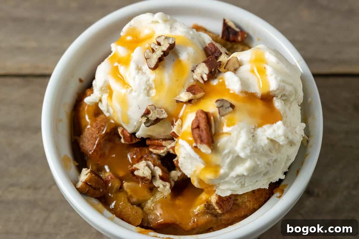 Pineapple Banana Bread Pudding Recipe for Moist, Fruity Dessert 8 Pineapple Banana Bread Pudding topped with caramel sauce, pecans, and ice cream.