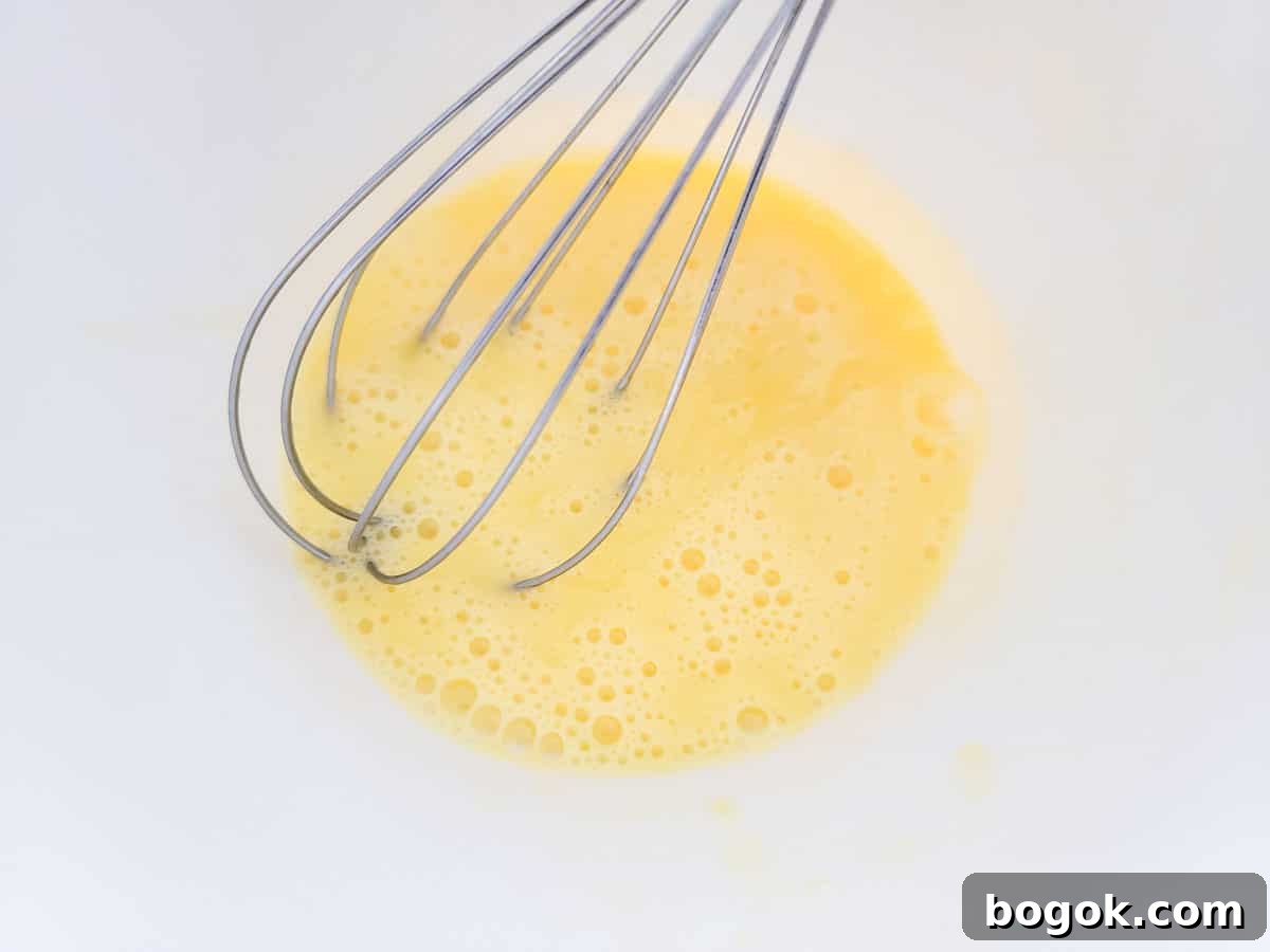 Pineapple Banana Bread Pudding Recipe for Moist, Fruity Dessert 3 egg whisked until frothy.