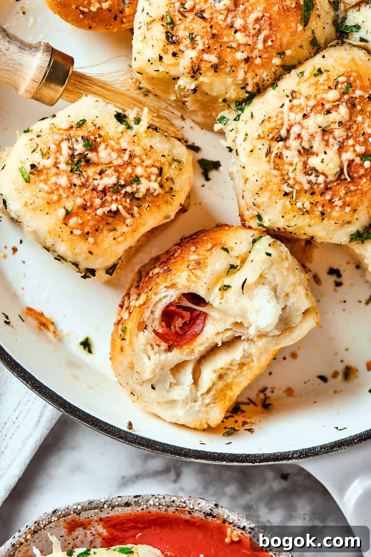 A few pizza bites are shown in a skillet.