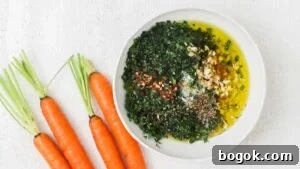Very finely chop carrot tops, Italian parsley, and garlic. Add to a bowl.