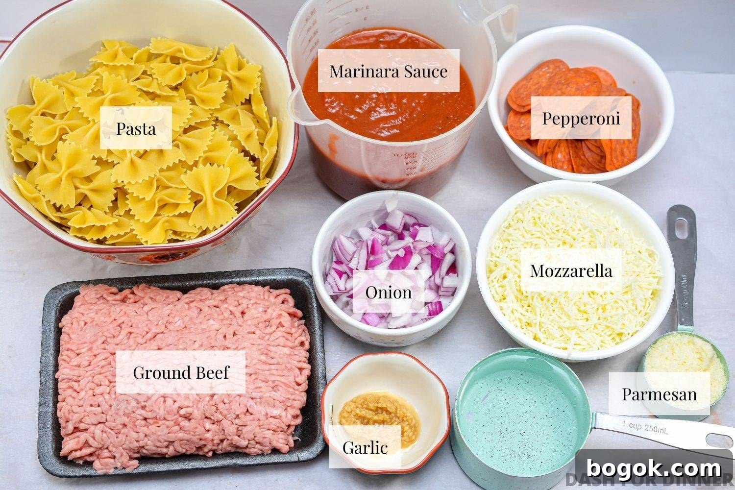 Slow-Cooker Pizza Casserole Recipe for Busy Weeknights 3 The ingredients needed to make a crock pot pizza casserole.