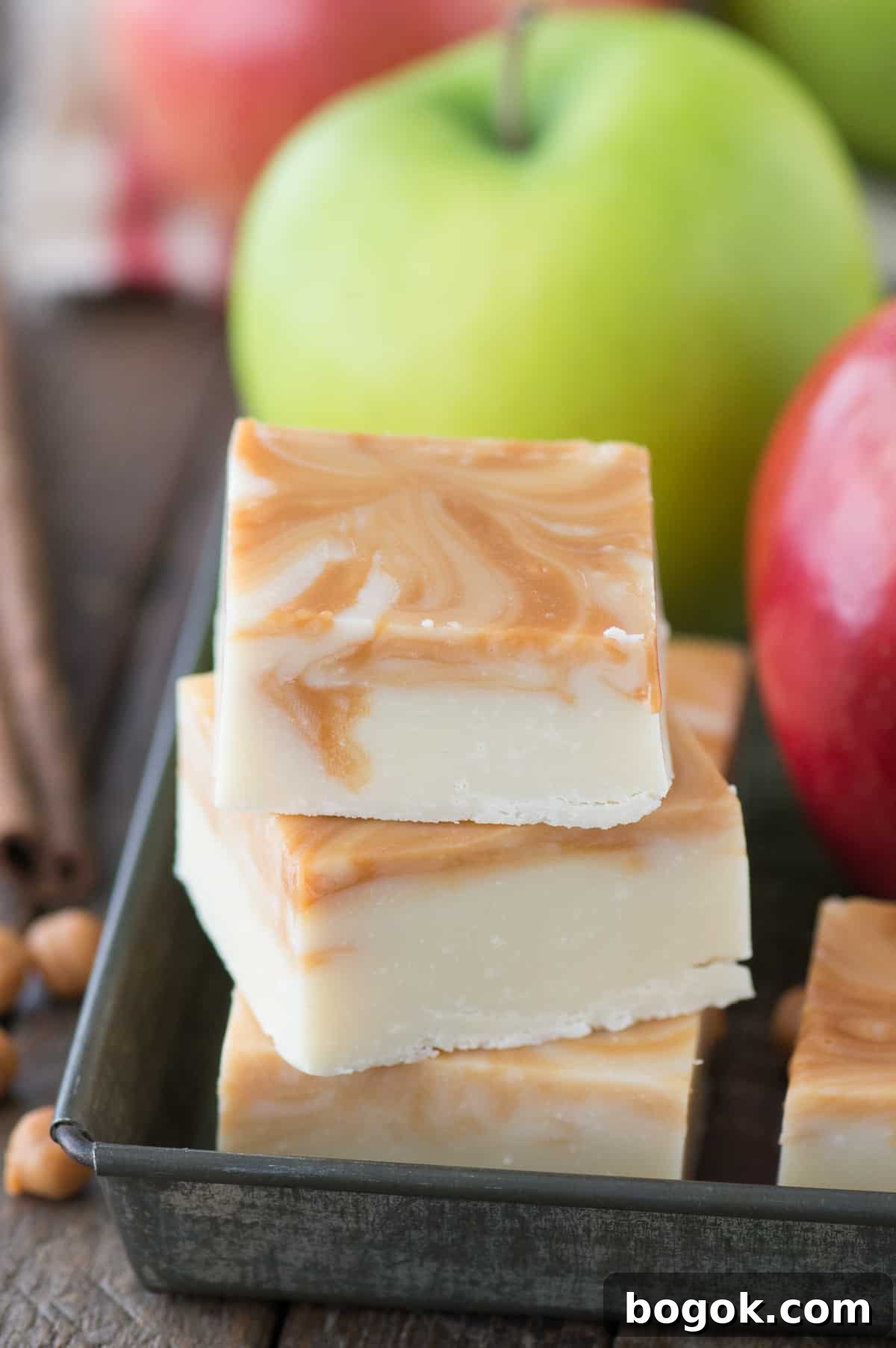Salted Caramel Apple Fudge Recipe for Fall Treats 3 pieces of caramel apple fudge in metal tray