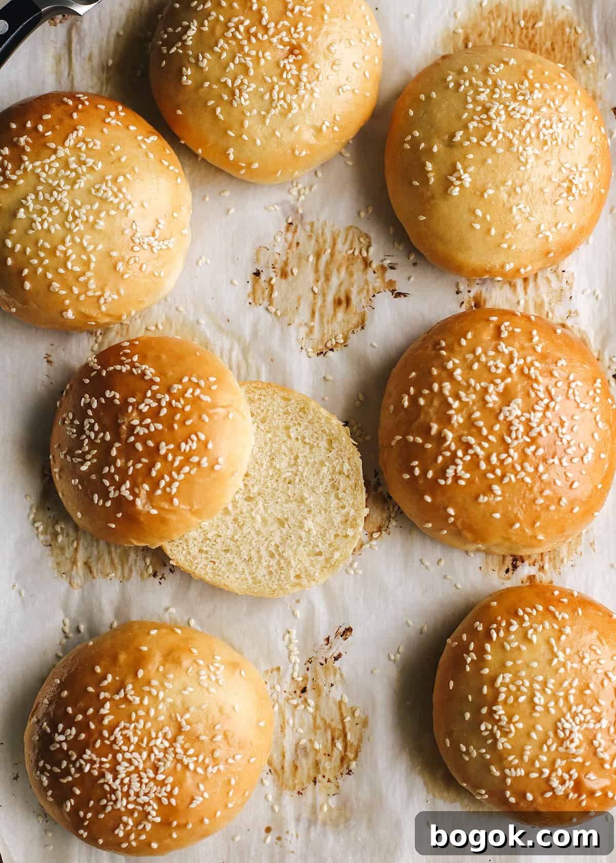 7 Homemade Hamburger Buns, one cut in half
