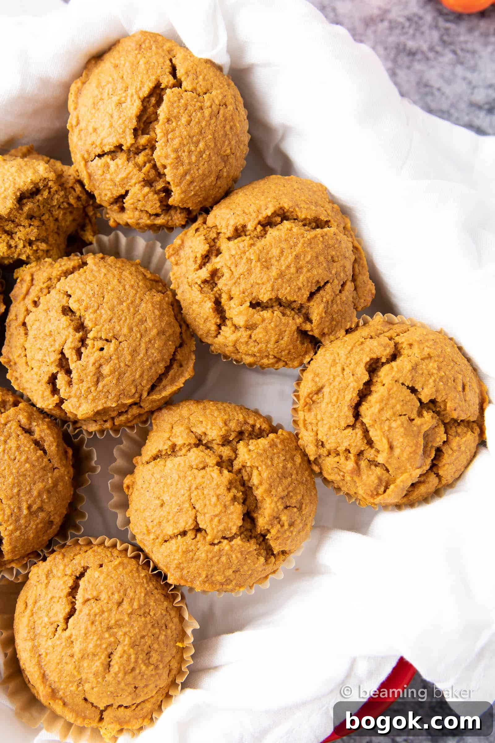 Vegan Pumpkin Muffins: this vegan pumpkin muffin recipe is easy & eggless! The best vegan pumpkin muffins – moist, soft & tender crumb, perfectly spiced. #Vegan #Pumpkin #Muffins #Fall | Recipe at BeamingBaker.com