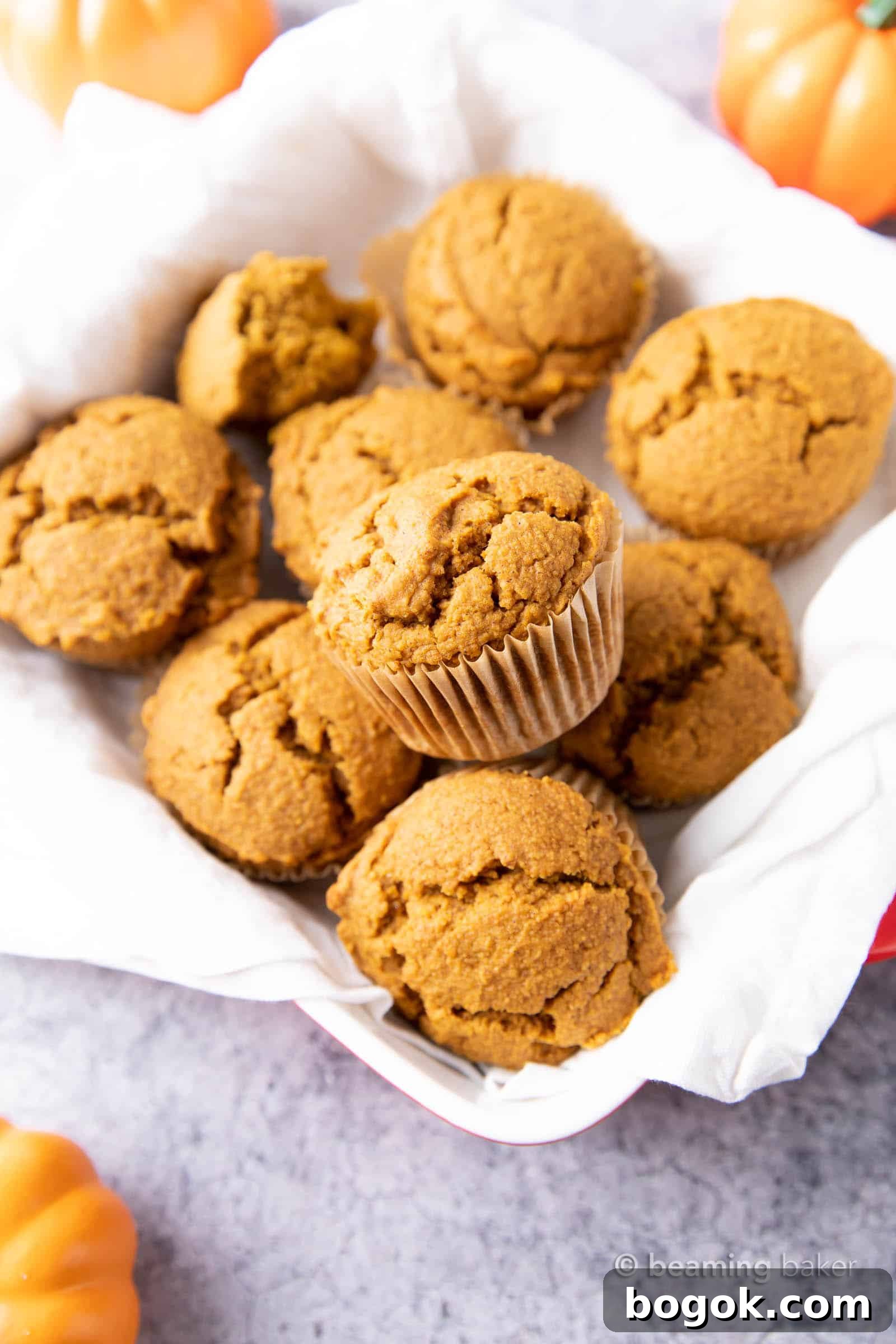 Vegan Pumpkin Muffins: this vegan pumpkin muffin recipe is easy & eggless! The best vegan pumpkin muffins – moist, soft & tender crumb, perfectly spiced. #Vegan #Pumpkin #Muffins #Fall | Recipe at BeamingBaker.com