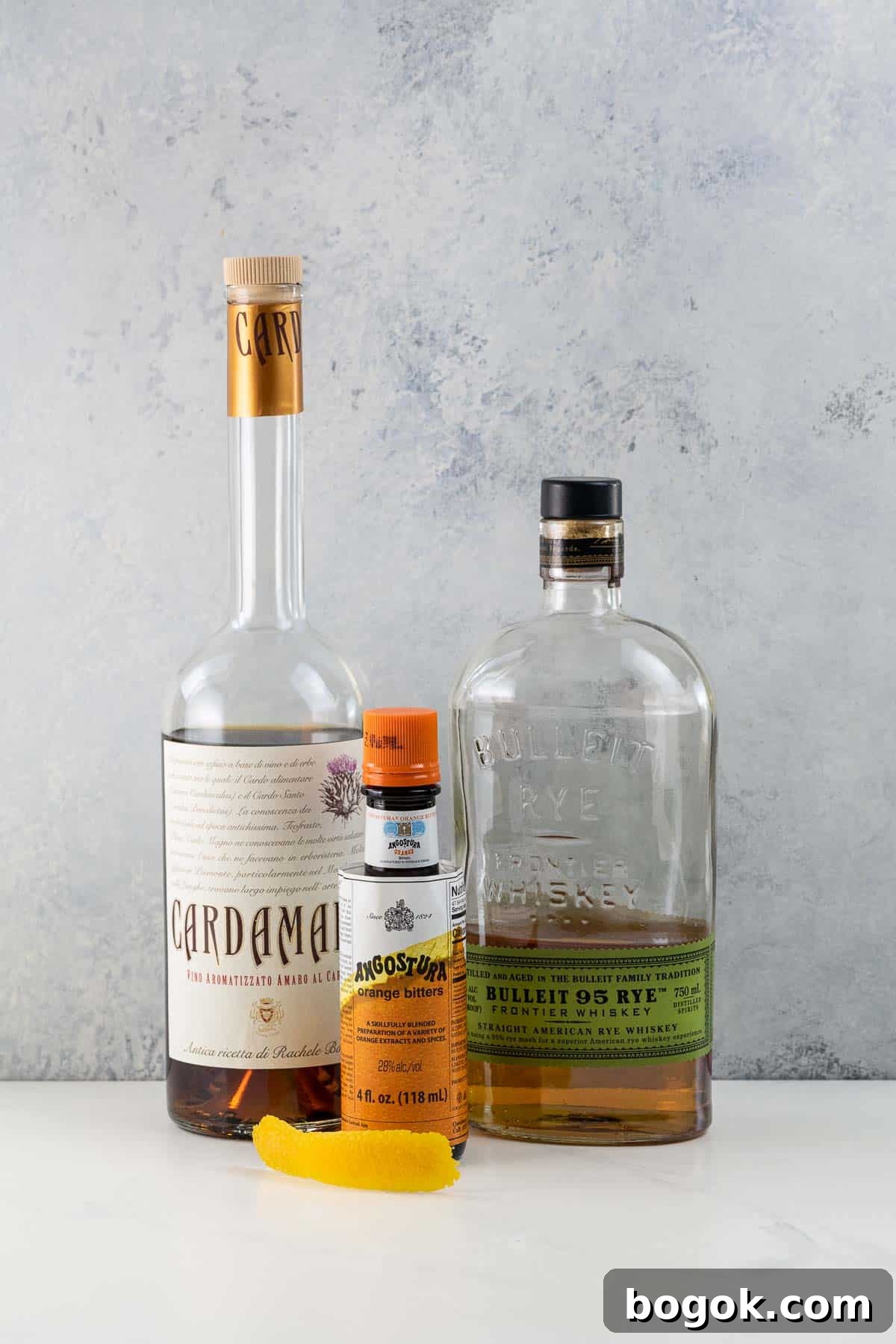 rye whiskey, cardamaro vino amaro, orange bitters, and an orange twist for a corduroy cocktail