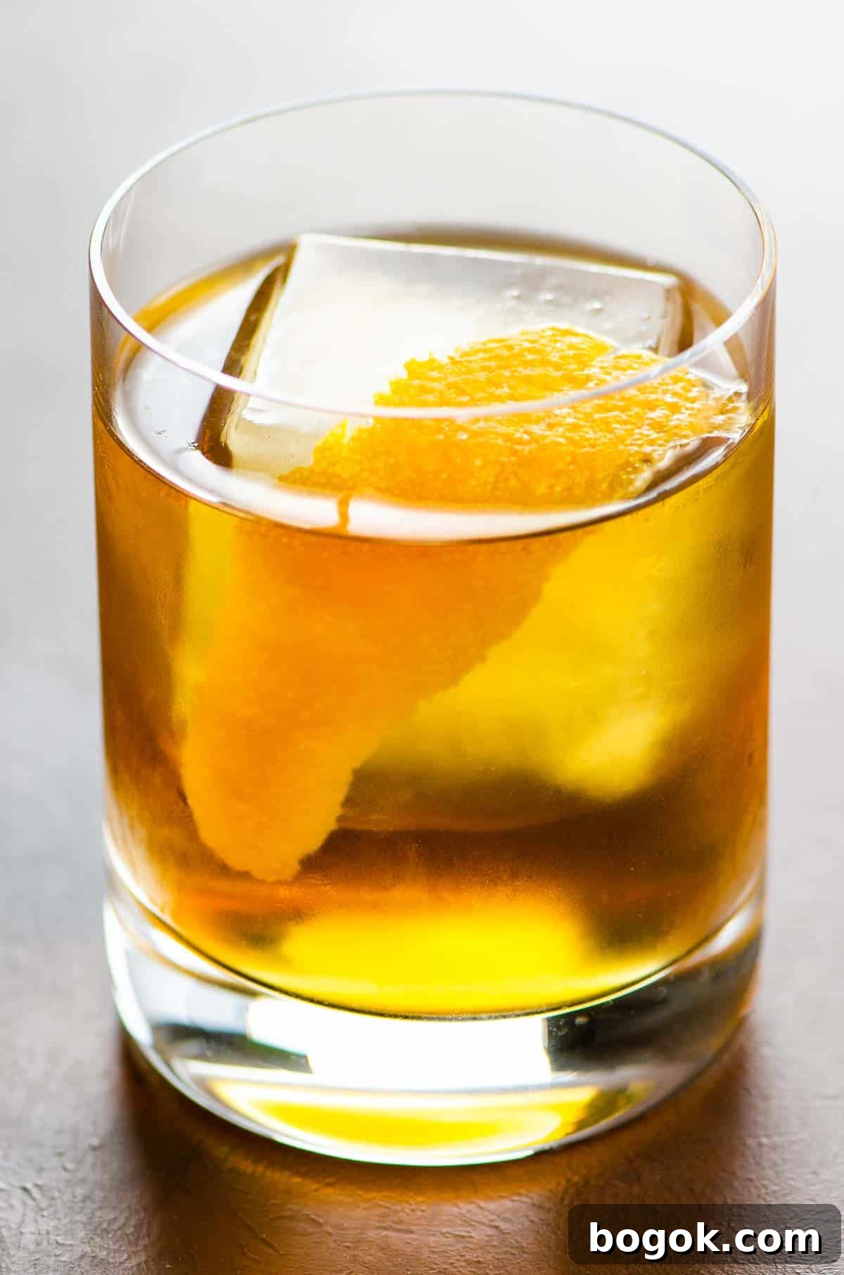 The Corduroy rye and cardamaro cocktail in a rocks glass garnished with an orange twist