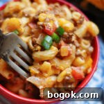 This is the best Chili Mac recipe made on the stove top & finished under the broiler in less than 30 minutes.