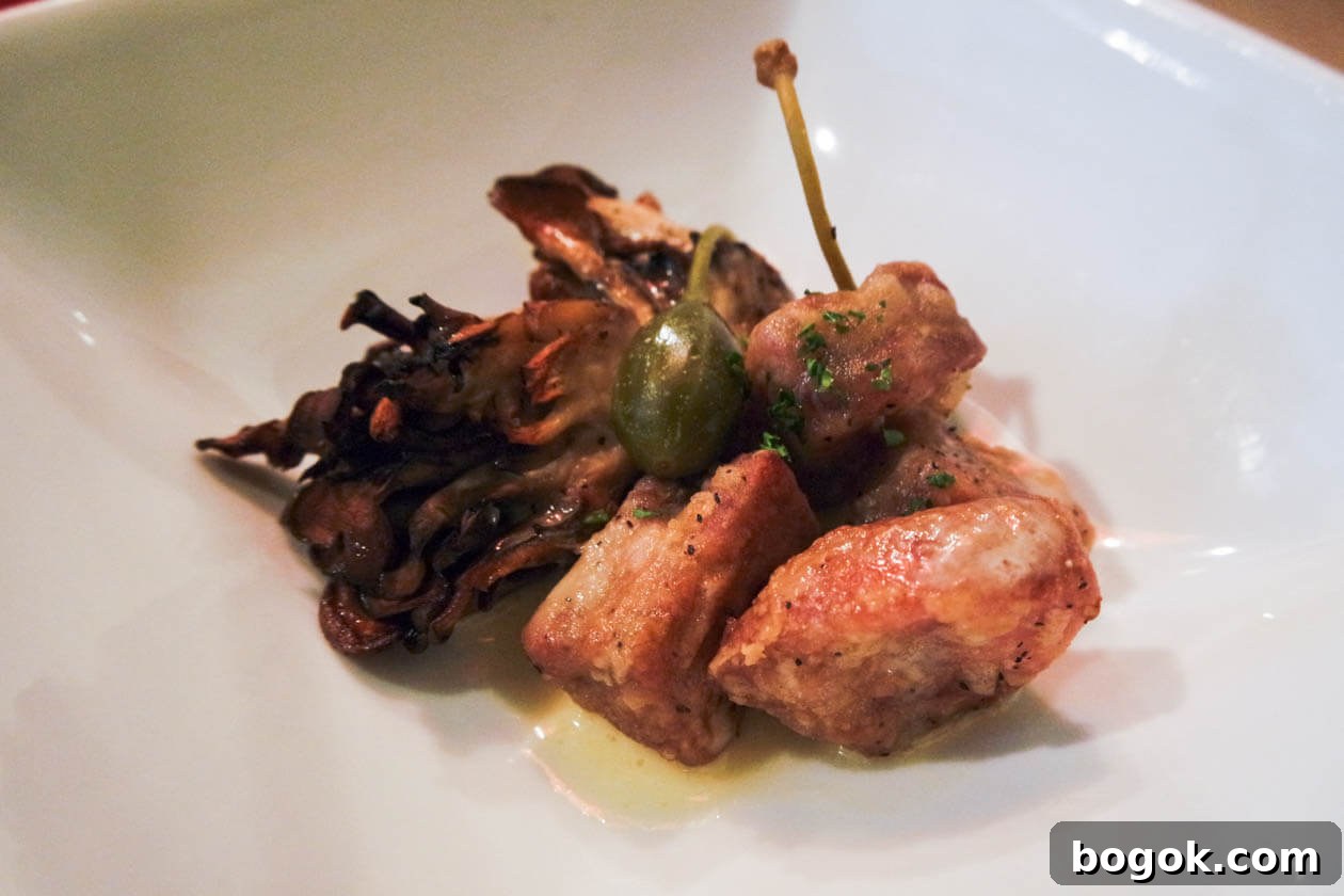 Sautéed sweetbreads, hen of the wood mushrooms, caper berries, champagne butter
