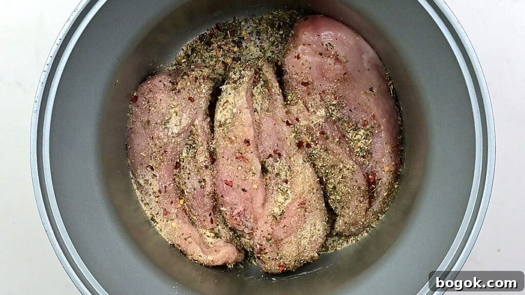 chicken breasts coated with Italian seasoning