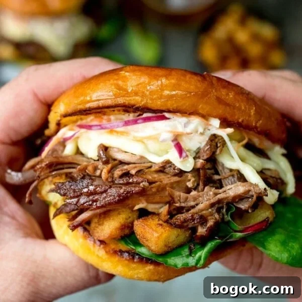 This Brisket Sandwich with garlic saute potatoes and homemade coleslaw is proper man-food - perfect for Father's day!