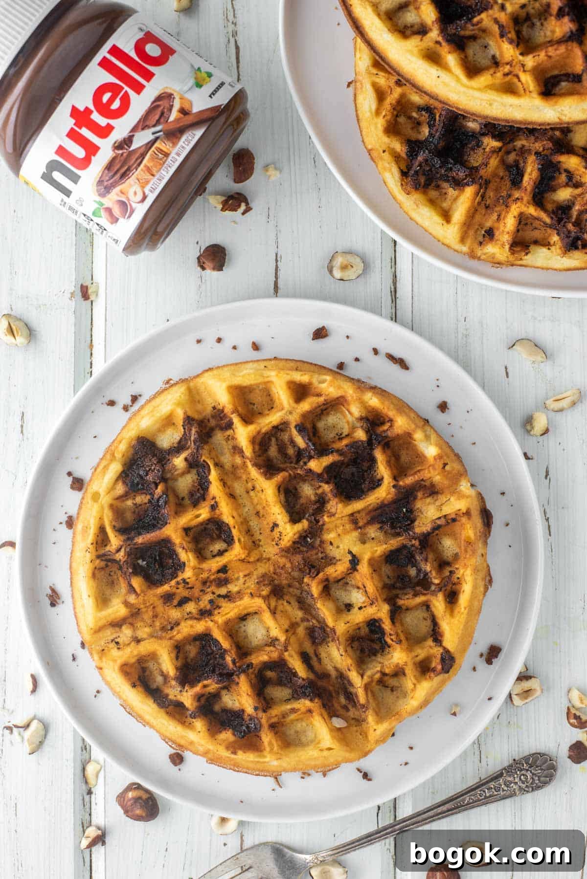 Decadent Nutella-Stuffed Waffles for Brunch or Dessert 3 overhead shots of Nutella waffles on plates