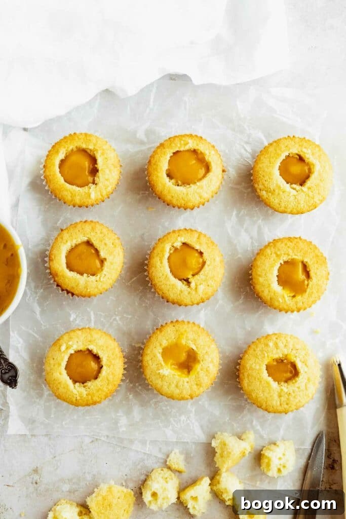 Mango Cupcakes with Luscious Mango Filling 4 filled mango cupcakes