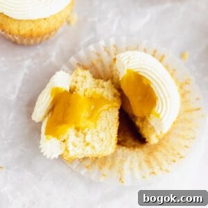 Mango Cupcakes with Luscious Mango Filling 9 cut open mango cupcake filled with runny mango filling