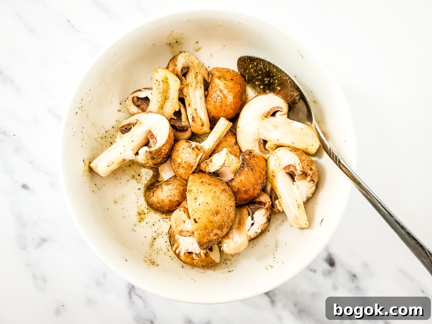 Crispy Garlic Air-Fryer Mushrooms — Low-Carb Side Dish 5 Bella mushrooms in a bowl with garlic