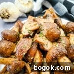 Crispy Garlic Air-Fryer Mushrooms — Low-Carb Side Dish 8 air fried mushrooms on a platter