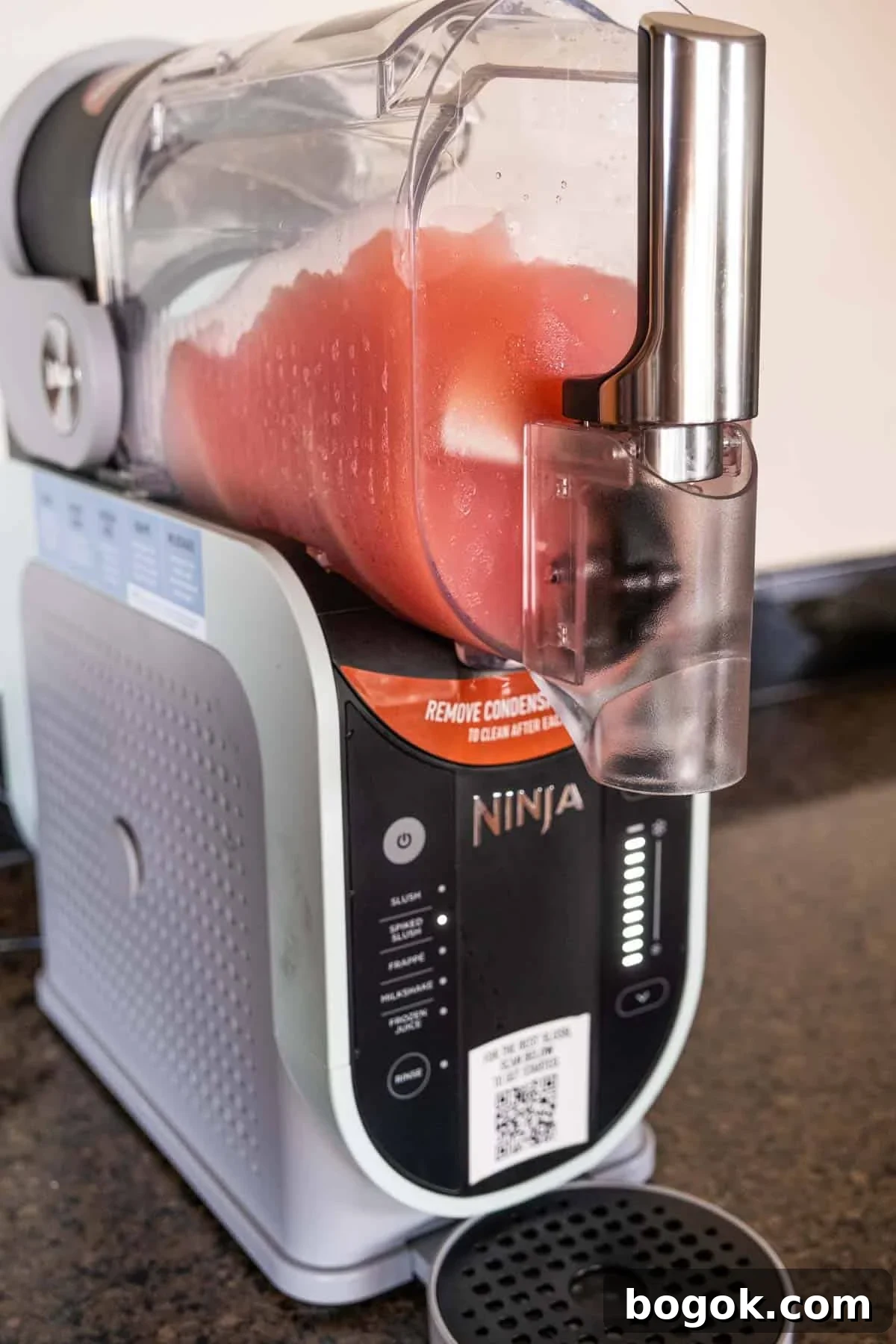 Rosé Wine Slushie Recipe for Ninja SLUSHi Machine 4 A rosé wine slushy being made in a Ninja Slushi Machine.
