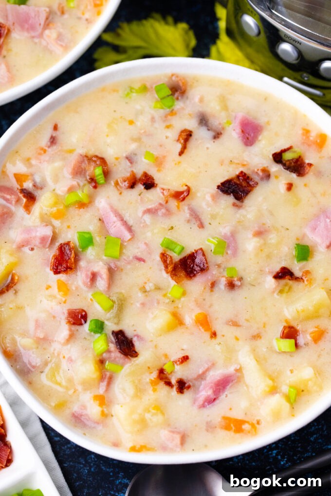 Creamy Slow Cooker Ham & Potato Soup Recipe 13 Homemade slow cooker ham and potato soup with bacon.