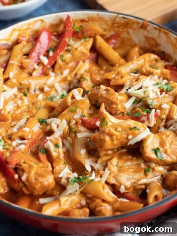 A pan of creamy bbq chicken pasta.