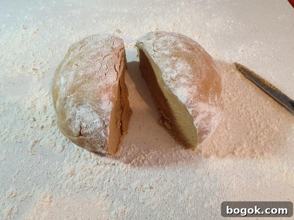 cutting shaped dough in half.