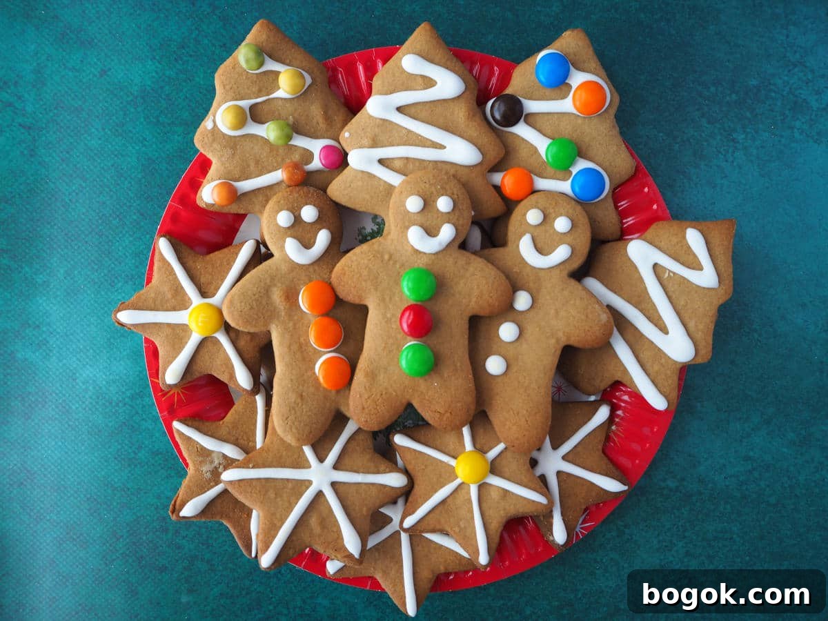 plate of gingerbread with gingerbread men, christmas trees and stars.