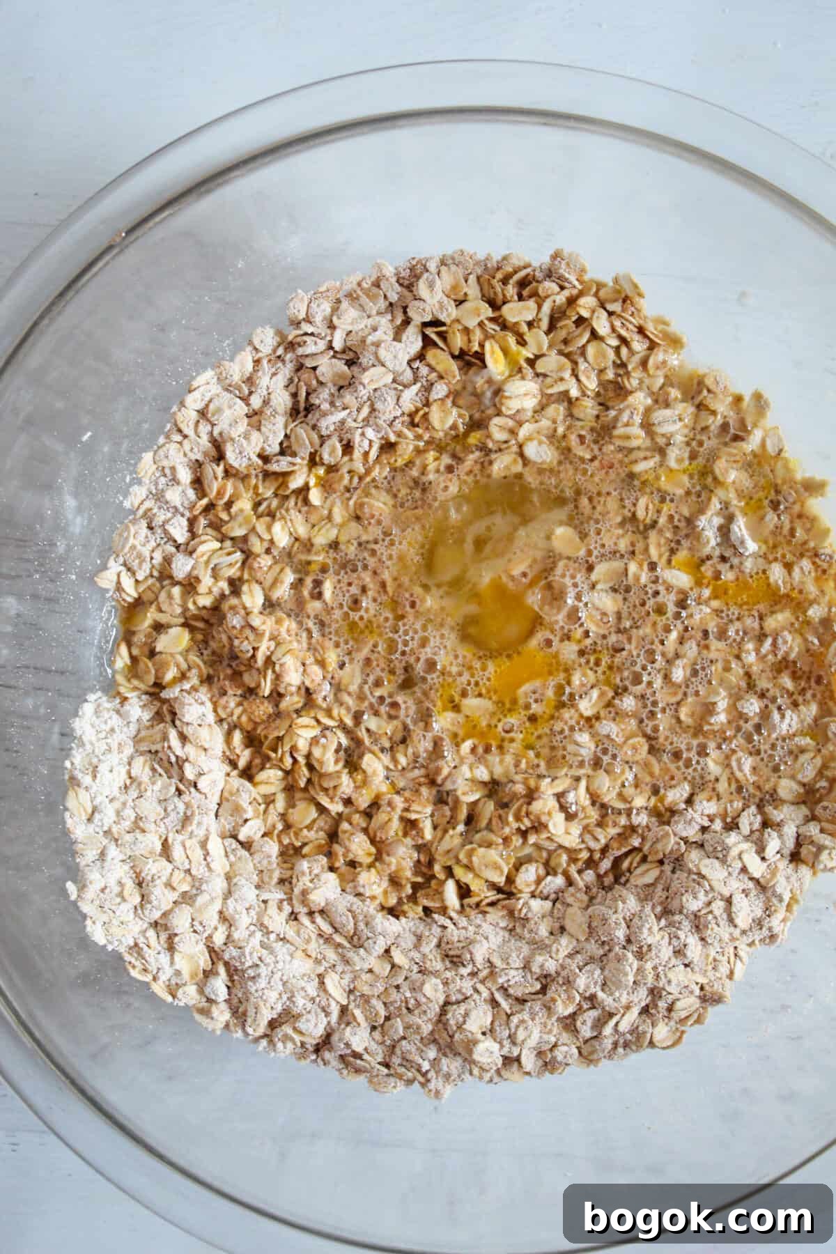 wet ingredients added to a bowl.