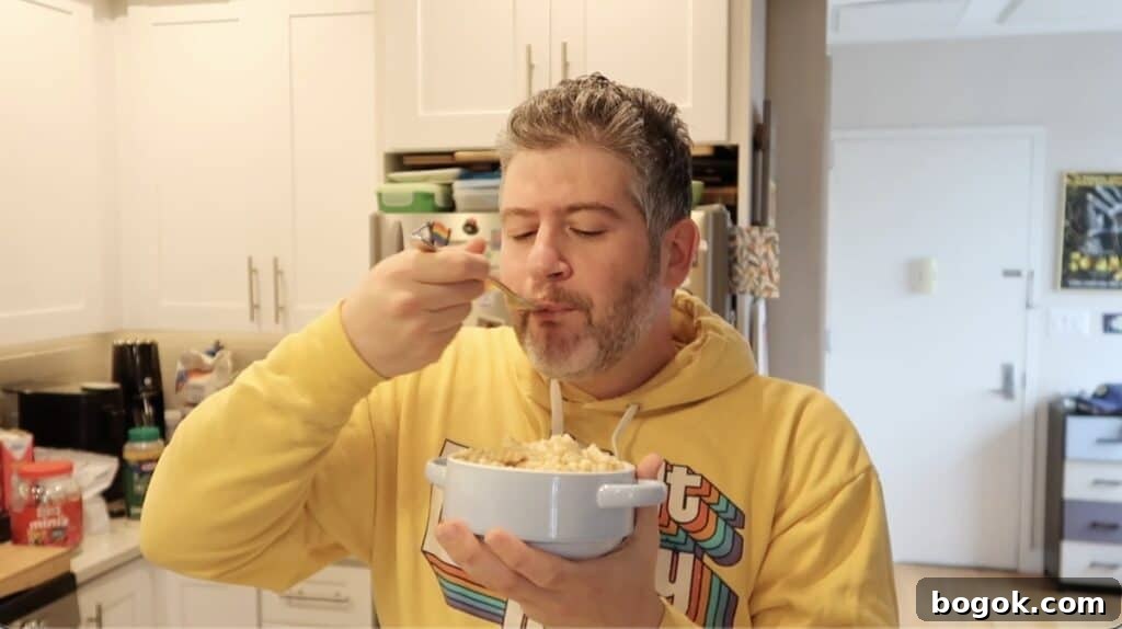 Garlic Herb Cheese Pasta Made in the Instant Pot 13 Man eating pasta with fork