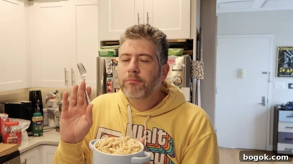 Garlic Herb Cheese Pasta Made in the Instant Pot 14 Man looking stunned by how good the pasta tastes