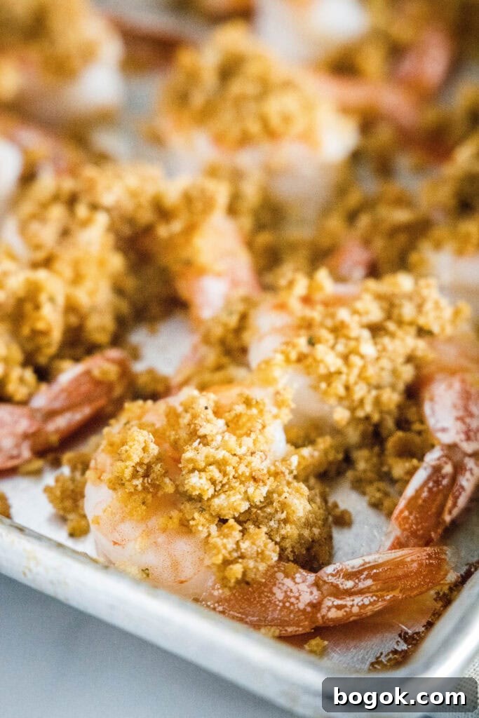 crispy baked shrimp on a baking sheet
