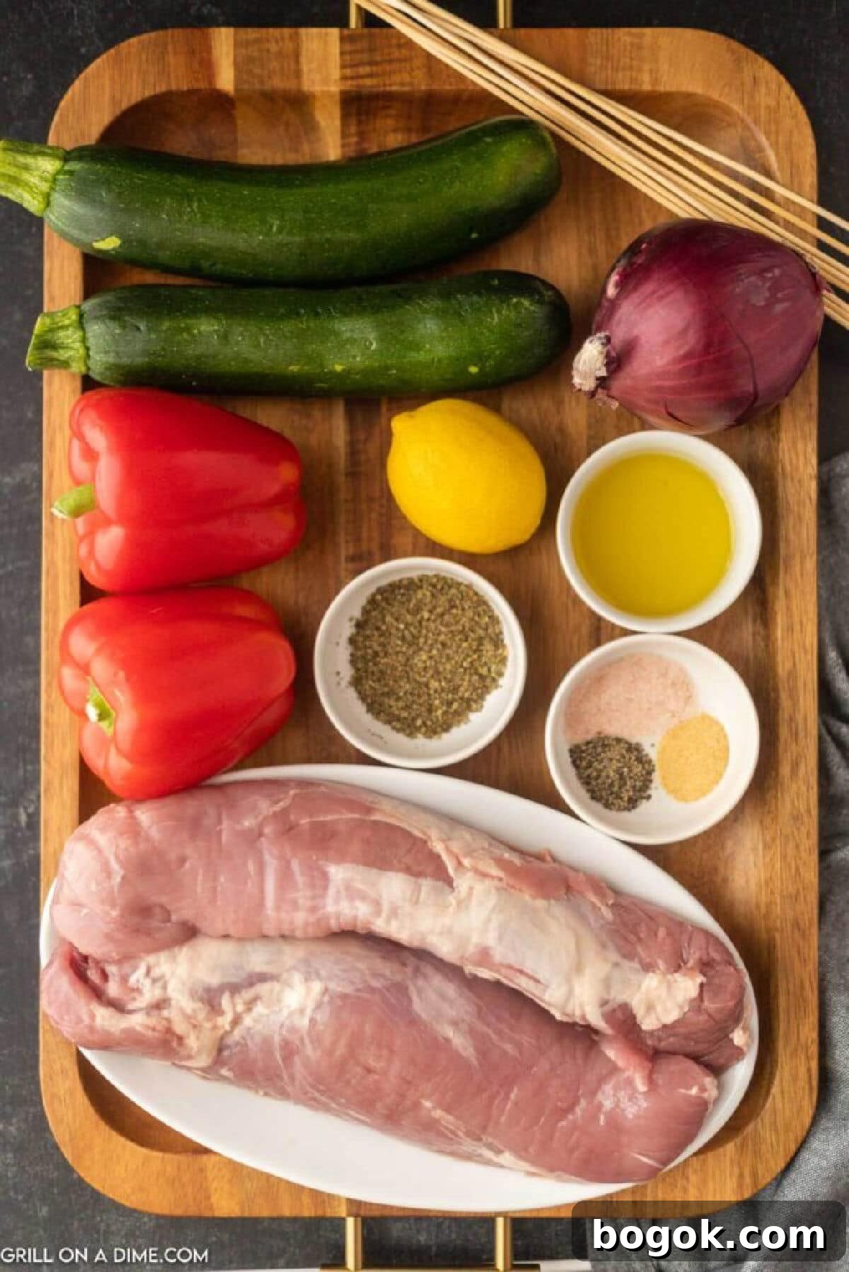 Ingredients needed - pork tenderloin, zucchinis, red onion, red bell peppers, italian seasoning, salt and pepper, garlic powder, olive oil, lemon