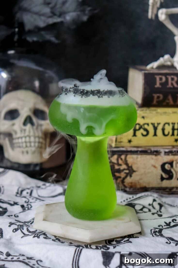A smoky green Halloween margarita.