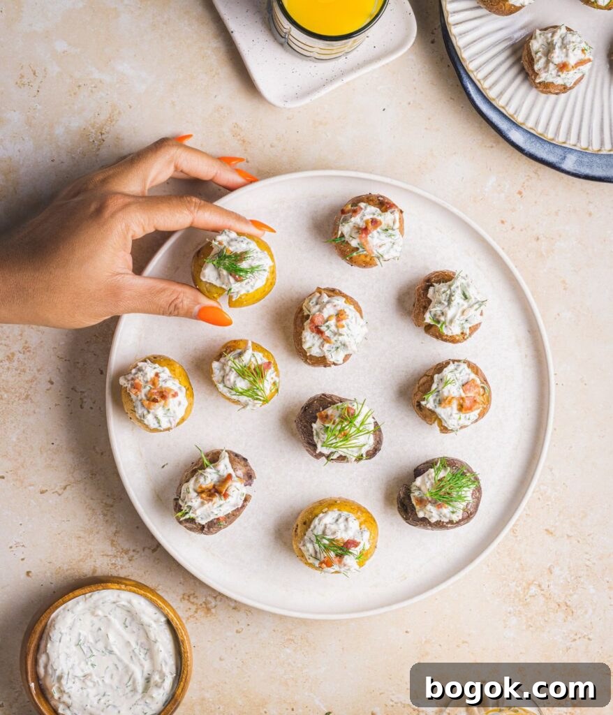 baked potatoes with dill cream served on a plate 