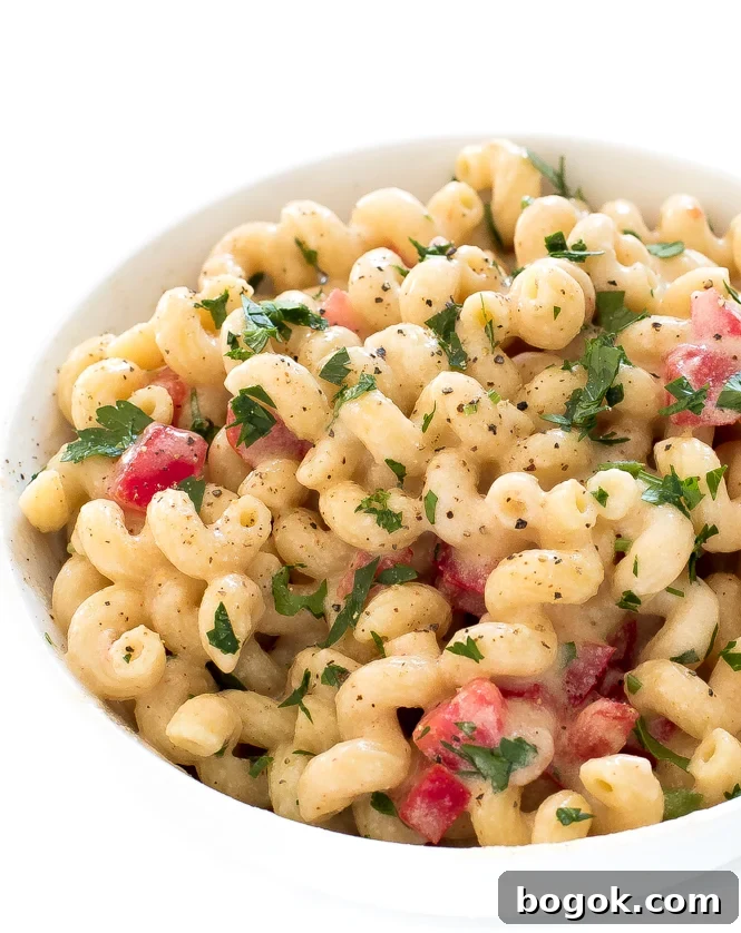 Spicy Pepper Jack Mac and Cheese in white bowl.