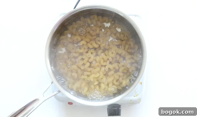Pasta cooking in boiling water.