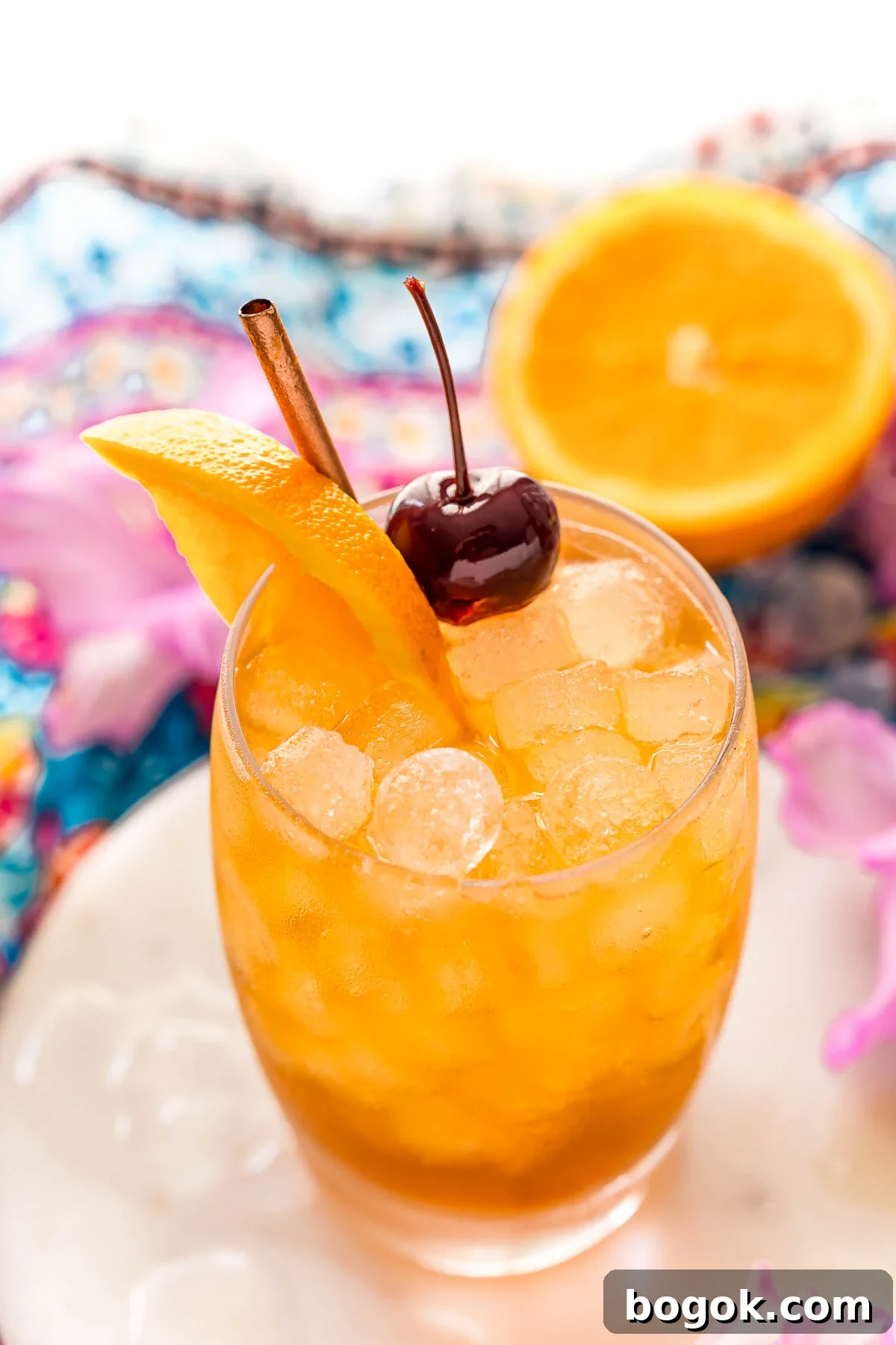 Classic Amaretto Sour Cocktail Recipe with a Citrus Twist 3 Close up angled photo of a glass with an amaretto sour.