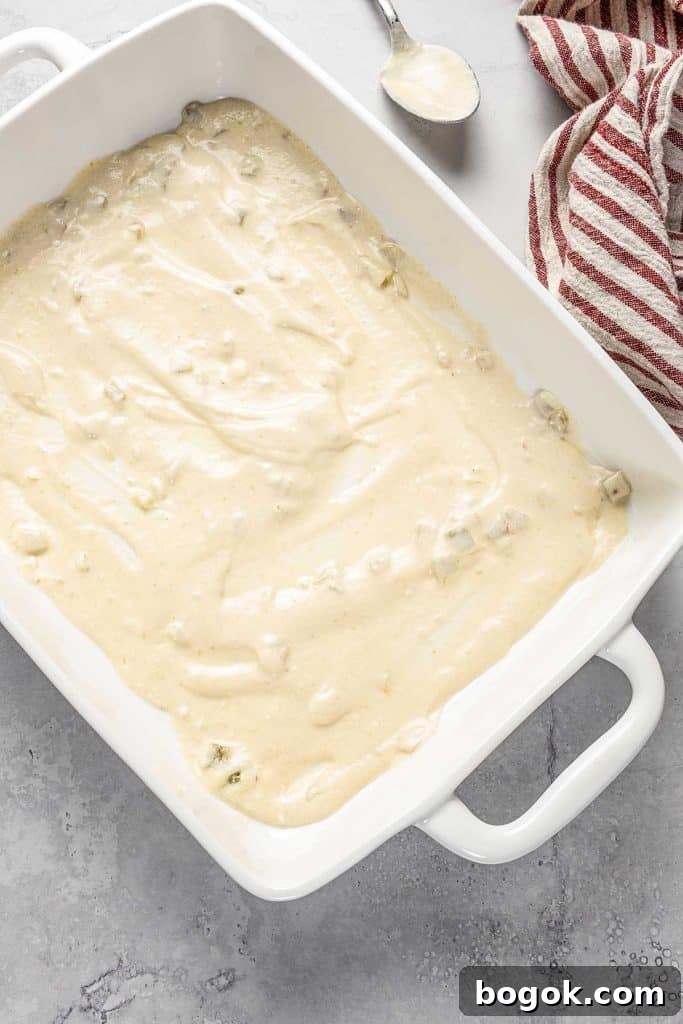 enchilada sauce in a baking dish