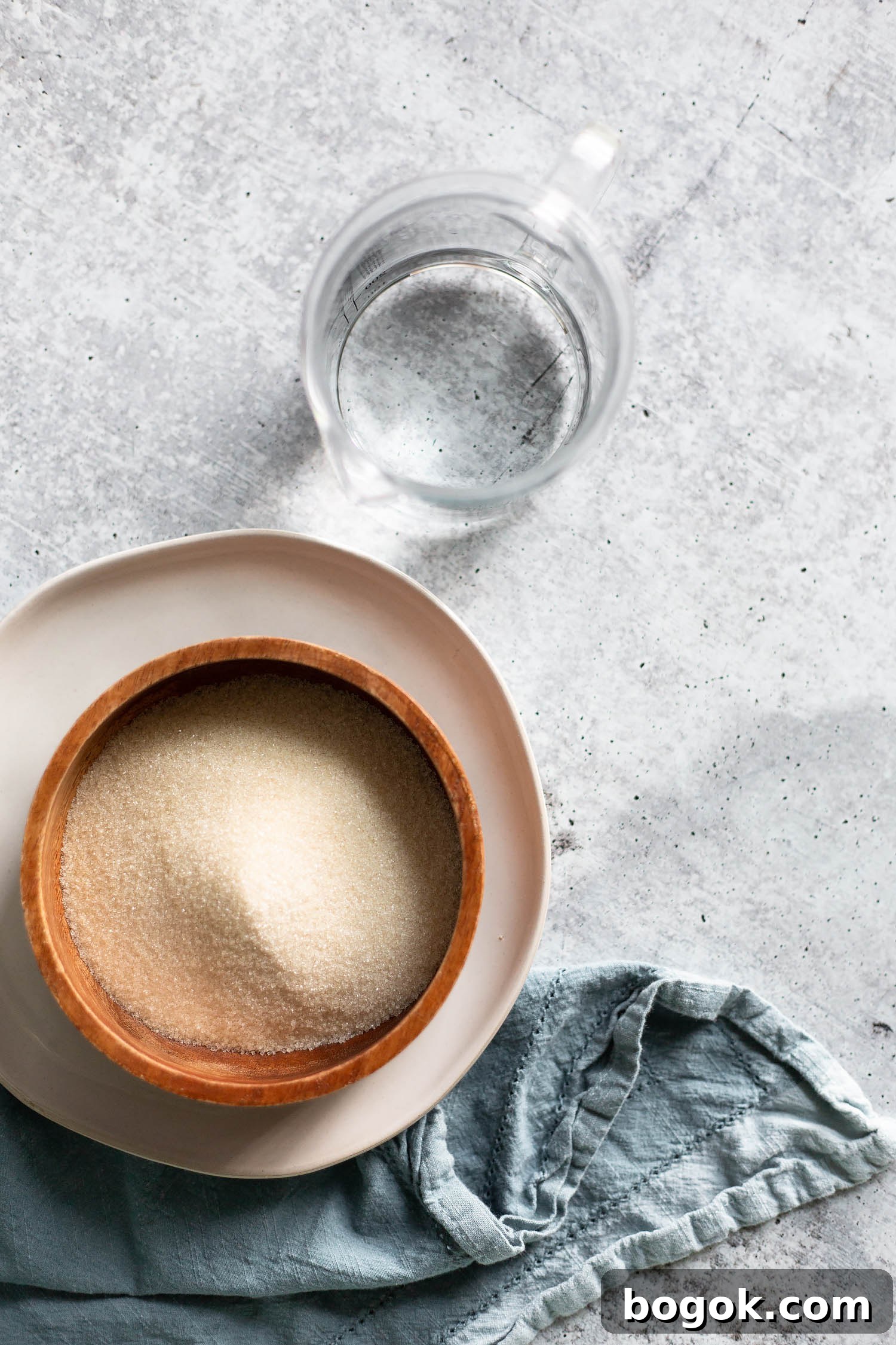 How to Make Simple Syrup at Home for Cocktails and Baking 4 sugar in a bowl and water from the top down