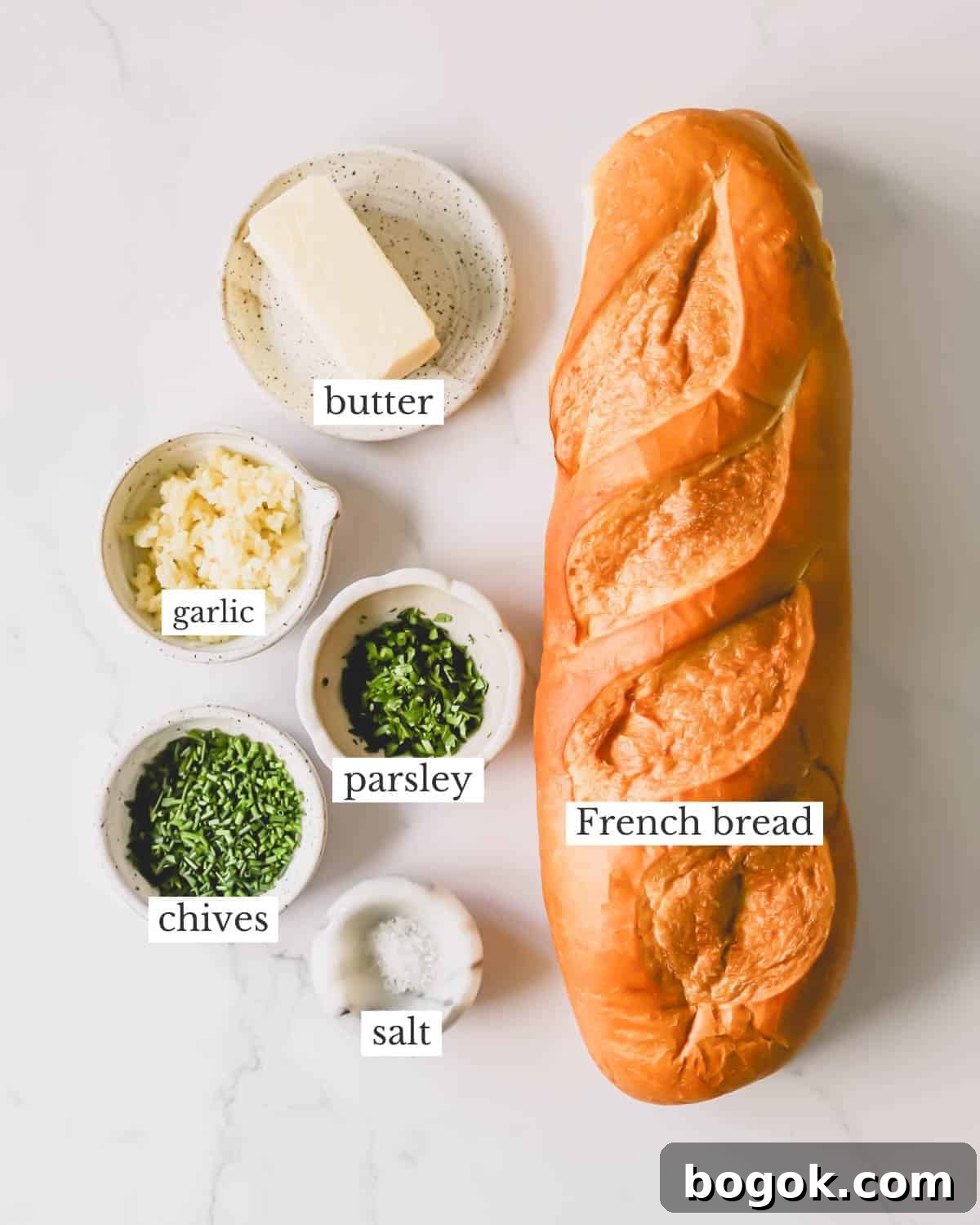 Garlic Bread Recipe with Crispy Herb Butter Crust 4 Ingredients needed to make homemade garlic bread with an herbed butter spread.